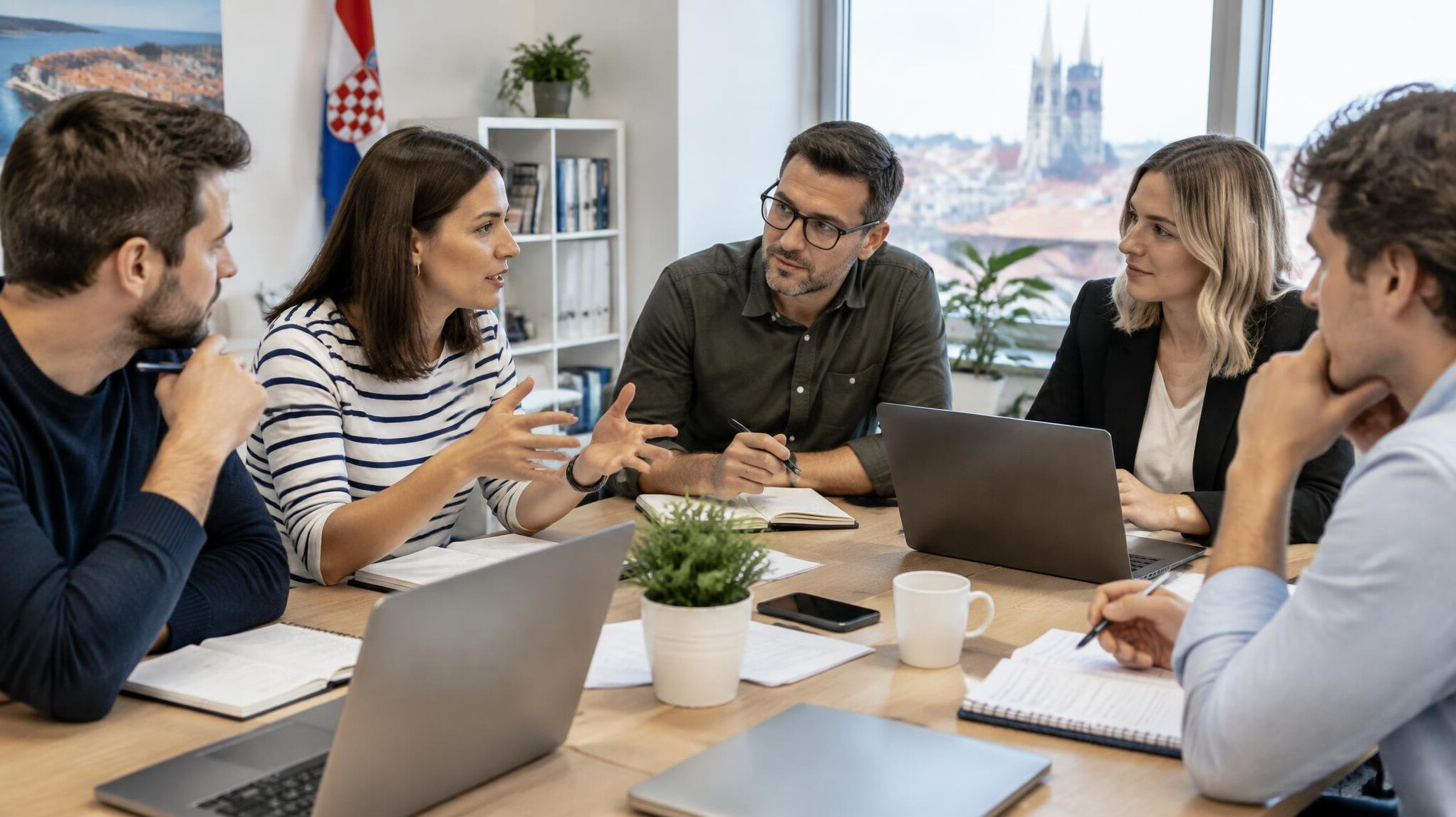 Team meeting around a table with notes